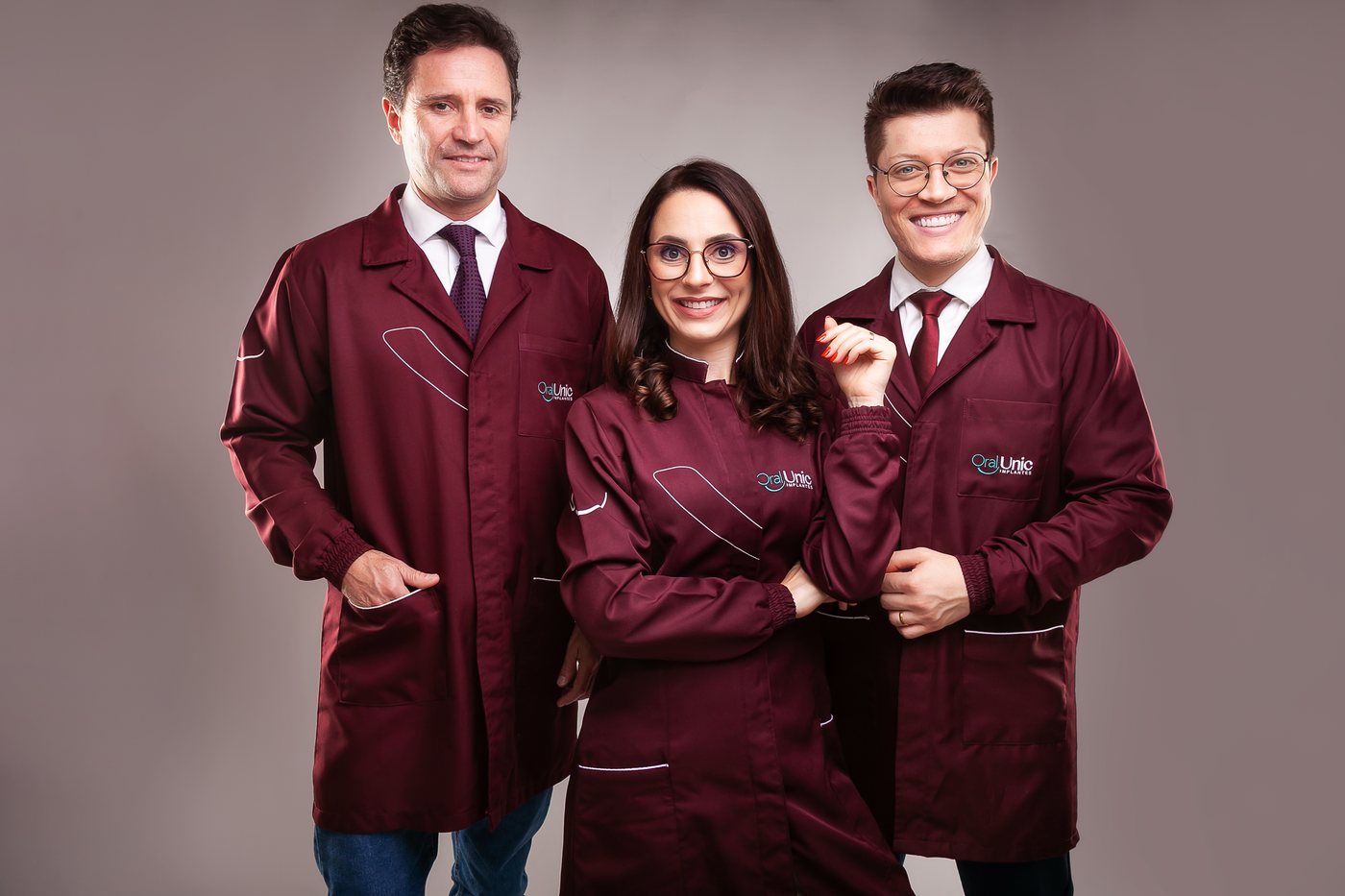 Dra. Letícia Cazarotto Pin, Dr. Matheus Lunardi e Dr. Fernando Puhl, equipe de cirurgiões-dentistas da Oral Unic Farroupilha